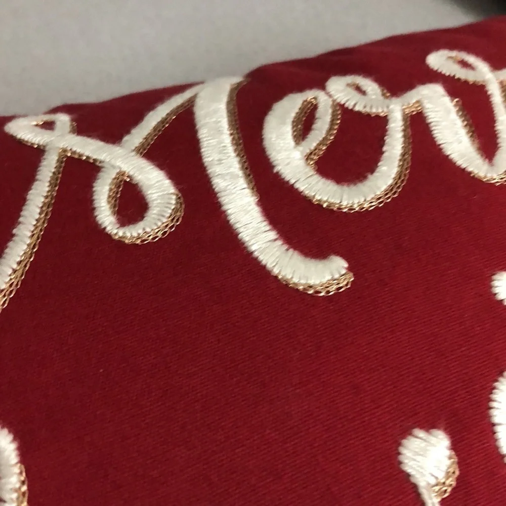 Embroidered Pillow with Tassels